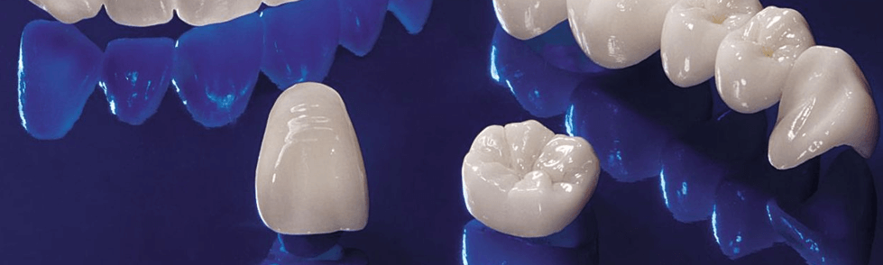Восстановление зубов коронками: виды и показания